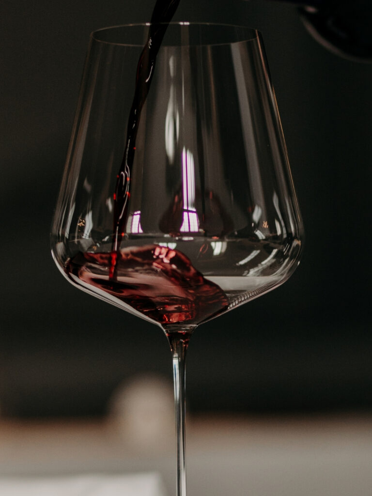 Elegant Cahors red wine glass, highlighting the depth and color of Malbec.